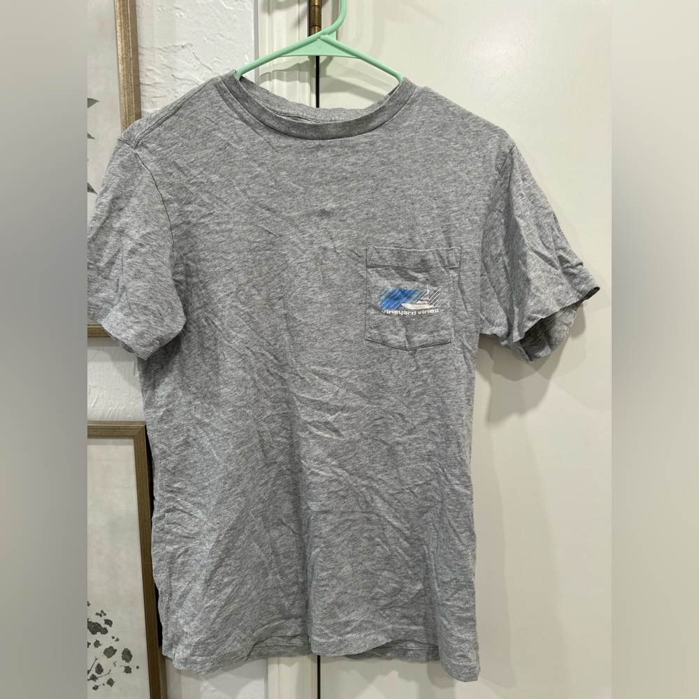 Grey vineyard vines with a sail boat on the back.